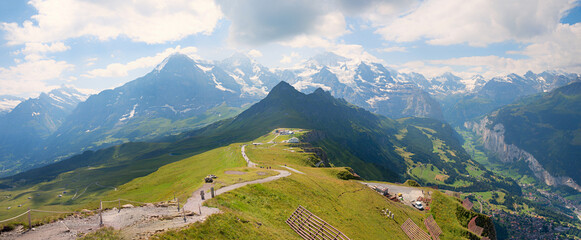 panorama landscape Mannlichen mountain with view to famous swiss alps and lauterbrunnen valley