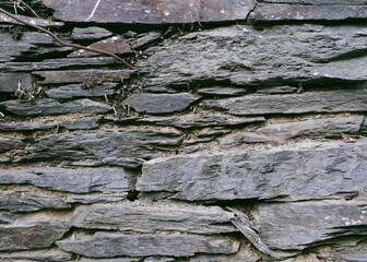 Stone and clay wall texture. Natural stone background.