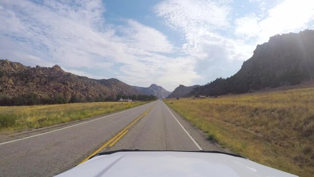 Time lapse driving in a mountain canyon on a sunny day