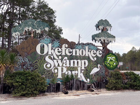 Waycross, Georgia, USA - March 3, 2022: A sign for the Okefenokee Swamp Park family attraction.