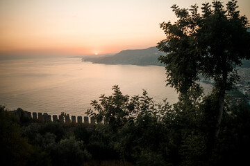 A beautiful bright sunset against the backdrop of the endless Mediterranean Sea. Sea sunset view