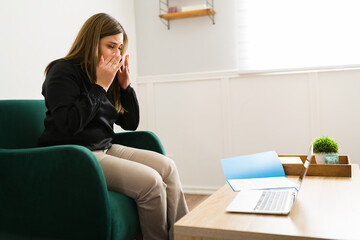 Stressed woman receiving bad news from her lawyer