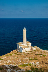Fototapeta na wymiar The lighthouse of Punta Palascia, in Otranto, Lecce, Salento, Puglia, Italy. The cape is Italy's most easterly point. The building is on the promontory that separates the Adriatic and Ionian seas.