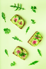 Toasts with watemelon radish, avocado and flex seeds