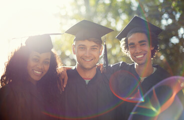College was the best four years of our lives. Portrait of a diverse group of students on graduation...