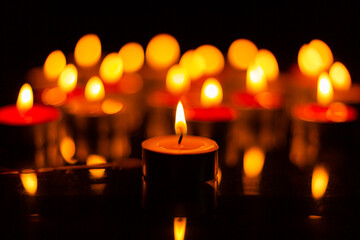 candle,burning candles on the dark surface of memorial day,Burning candles in darkness 