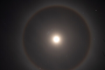 Halo phenomenon on the moon over Ukraine at night during the war in the country 2022, night moon...