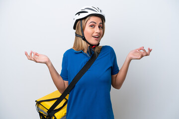 Young caucasian woman with thermal backpack isolated on white background with shocked facial expression
