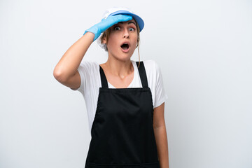 Fishwife woman isolated on white background doing surprise gesture while looking to the side