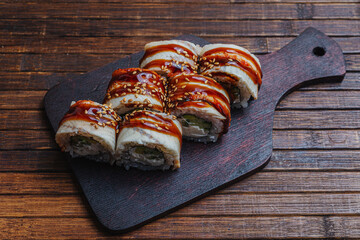 Asian traditional snack. Japanese sushi - fast food