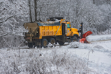 A Yellow Township snowplow removes the snow that fell last night on Seward Road in Windsor in Upstate NY.