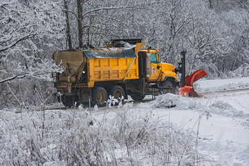 A Yellow Township snowplow removes the snow that fell last night on Seward Road in Windsor in...