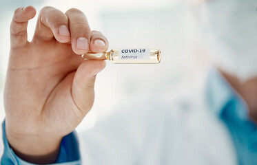 Coming to a pharmacy near you soon. Cropped shot of a scientist holding an ampoule with 2019-nCov on it.