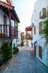 Fototapeta na wymiar Traditional houses in the streets of Kalkan, Turkish Mediterranean style