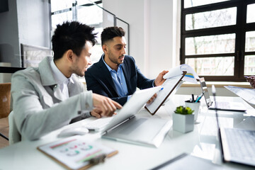 Financial Data Analysts Discussing Business