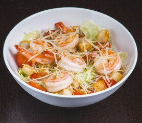 Healthy salad plate. Fresh seafood recipe. Grilled shrimps and fresh vegetable salad and egg. Grilled prawns. Healthy food. Flat lay. Top view