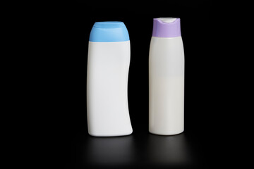 Body cream jars. Unbranded white jar with light blue lid and jar with violet lid.