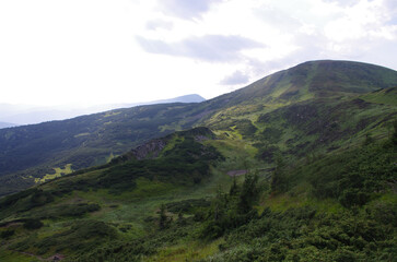 Mountain panoramic landscape with clouds and blue sky