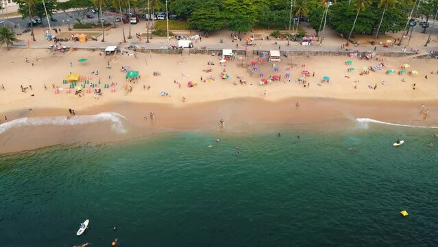 Aerial view of Praia Vermelha, in the neighborhood of Urca in Rio de Janeiro, Brazil. The hills of P&atilde;o de A&ccedil;ucar and Urca. Sunny day with some clouds at dawn. Drone take.