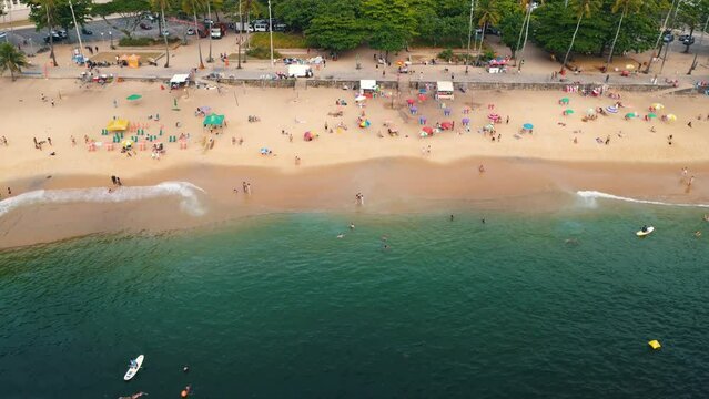 Aerial view of Praia Vermelha, in the neighborhood of Urca in Rio de Janeiro, Brazil. The hills of P&atilde;o de A&ccedil;ucar and Urca. Sunny day with some clouds at dawn. Drone take.