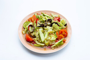 Spicy cucumber salad in plate