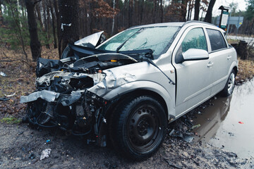 Obraz na płótnie Canvas Destroyed front bumper of a passenger car Warsaw outskirts Poland . High quality photo