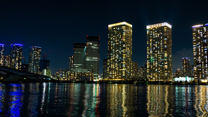 Fototapeta na wymiar Night view of a high-rise condominium along an urban river_42
