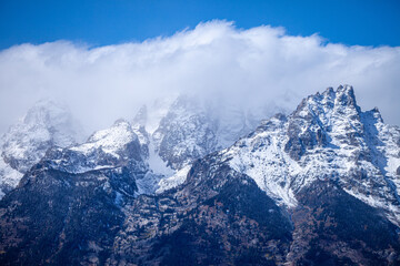 Fototapeta na wymiar Snow covered mountain peaks in the Grand Tetons National Park