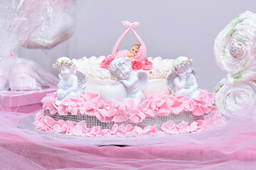 Newborn gift concept , cake pink Dessert with angels