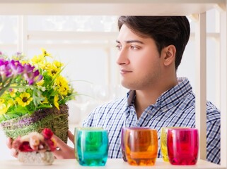 Young handsome man shopping in shop