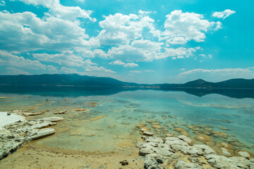 Turquoise lake Salda Turkey. White mineral rich beach. Salda lake with white sand and green water. Burdur Turkey