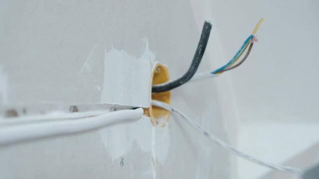 wires sticking out of the wall. electrical wiring repair