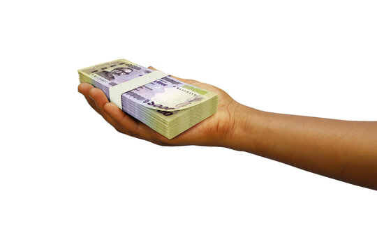 Hand Holding 3D rendered stack of Bangladeshi taka notes isolated on white background
