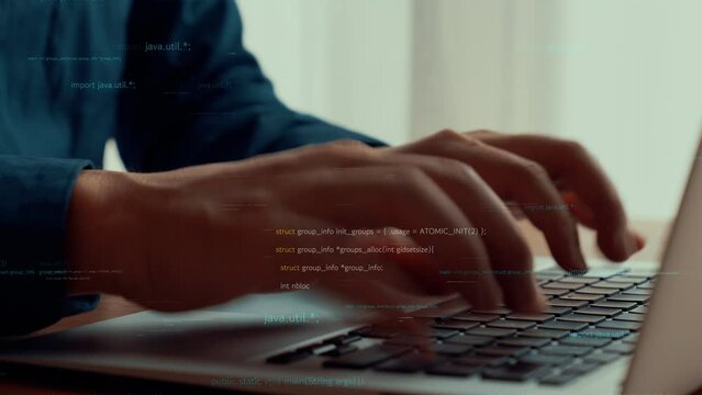 Computer programmer uses capable laptop computer to develop programming code of new software . Computer specialist working on future coding application for software programming development .