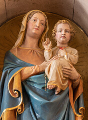 VIENNA, AUSTIRA - JUNI 18, 2021: The detail of statue of Madonna in Herz Jesu church by unknown artist. - obrazy, fototapety, plakaty