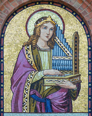 VIENNA, AUSTIRA - JULI 5, 2021: The mosaic of St. Cecilia  on the facade of St. Anthony church from...