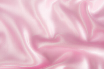 Smooth elegant pink silk or satin texture can use as abstract background.