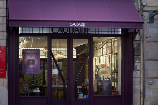 BORDEAUX, FRANCE - FEBRUARY 19, 2022: Caudalie logo in front of their local retailer in Bordeaux. Caudalie is a French cosmetics and beauty products spread in the world...