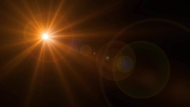 Optical Flare Orange Warm Lighting with Camera lens Effect. Shiny Gold Light Overlay Abstract Animation in dark Background	
