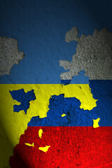 Paint the flags of ukraine and russia on the wall. Vertical image for your background.
