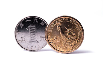 Two coins - 1 Chinese yuan and 1 American dollar