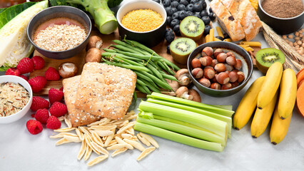 Foods high in fiber on gray background.