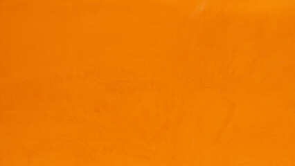 Orange cement surface, abstract pattern, the background can be used as screen saver, wall paper or background with copy space.