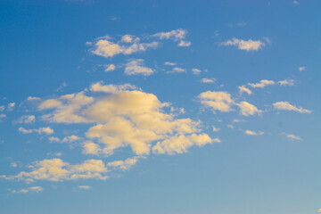 Fototapeta na wymiar Blue sky with fluffy cloud evening sky