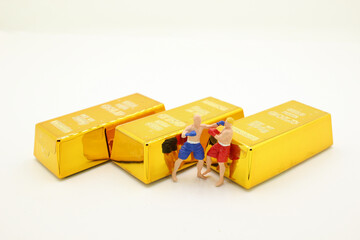 a professional boxer boxing with Gold bars