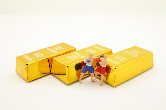 a professional boxer boxing with Gold bars - Powered by Adobe