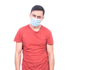 Sick man in medical mask standing in studio