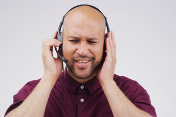 Efficient response is what great customer relationships are built on. Studio shot of a handsome young male customer service representative wearing a headset against a grey background.