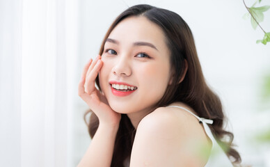 Fototapeta premium Image of beautiful young Asian woman in the morning