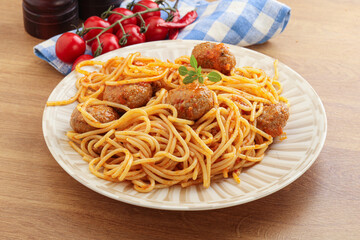 Spaghetti with meatball in tomato sause
